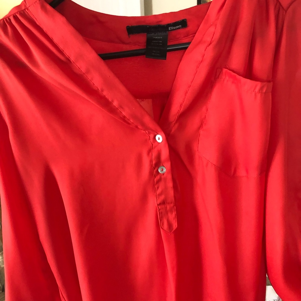 Cute quarter length blouse! Coral orange color
